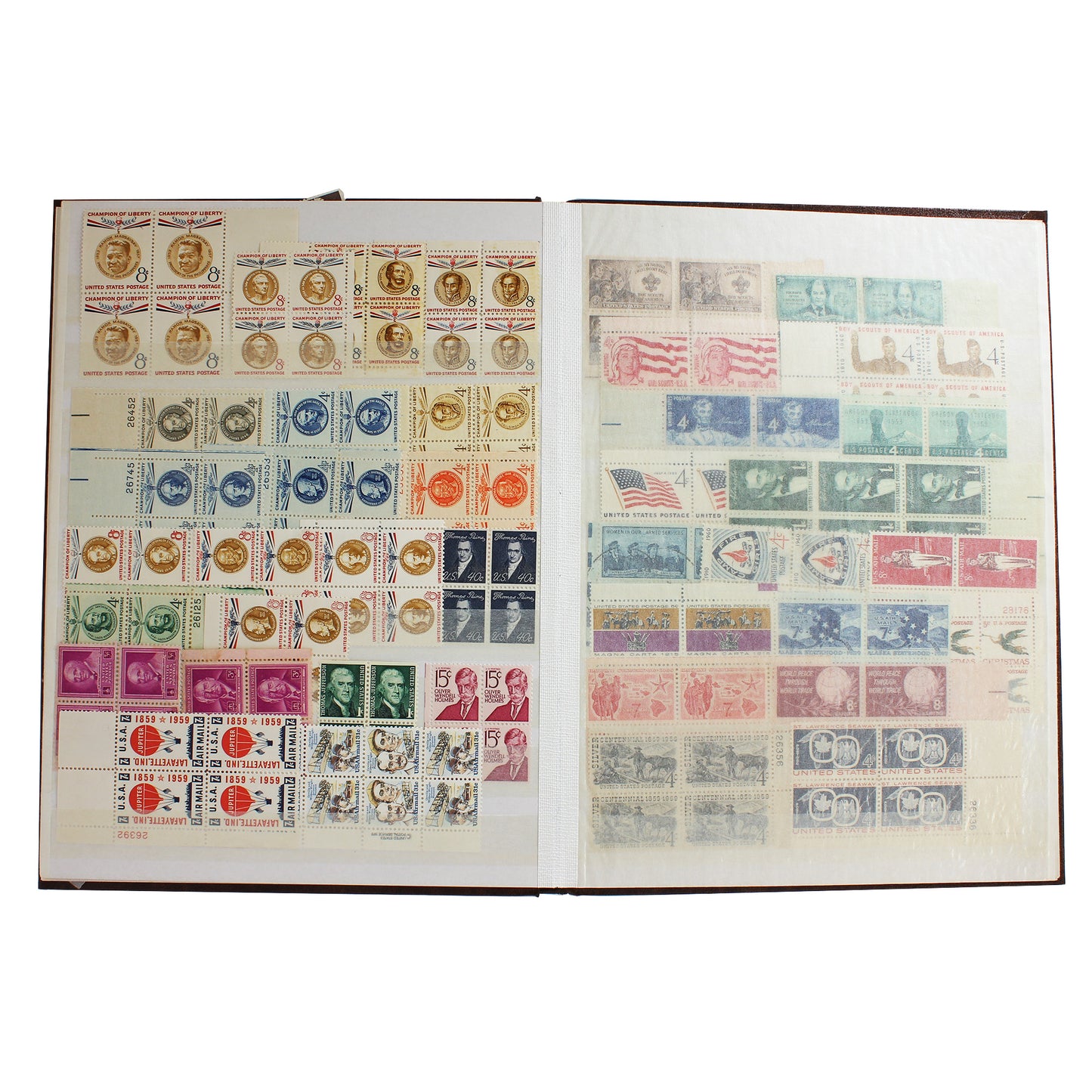 Lot of 150+ USA Stamps Mostly Mint in Brown Stamp Album