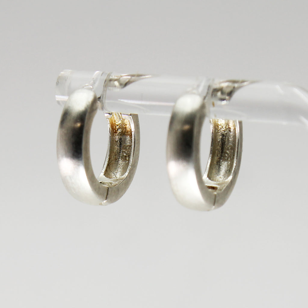 Lady's Sterling Silver Hoop Earrings with Hinged Button Release