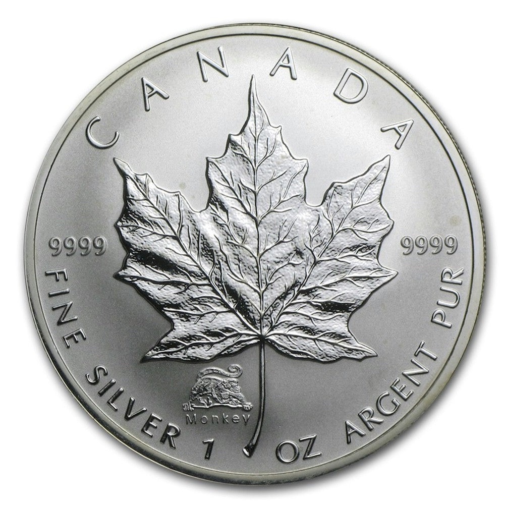 2004 Canada Year of the Monkey Privy 1oz. Silver Maple Leaf (TAX Exempt) Lightly Toned